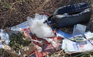 La maleta que dejaron al huir en Culiacán escondía dinero falso y droga